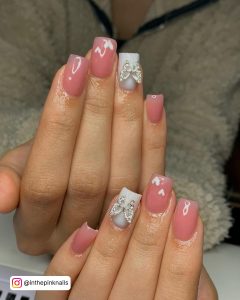 White Nails With Heart Design With Butterfly On Ring Finger