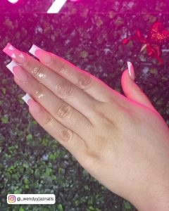 White Nails With Heart On A Pink Base