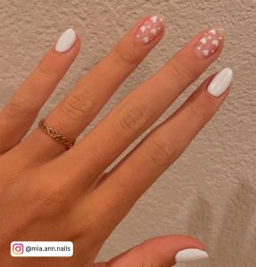 White Nails With Hearts For An Elegant Look