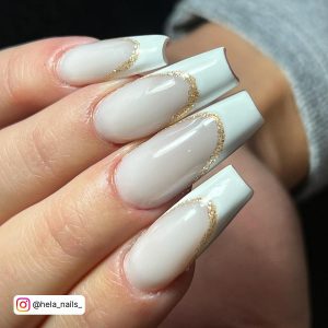 White Nails With Matte White Tips And Gold Glitter Stripes