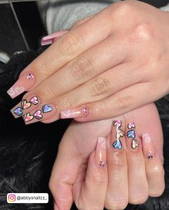 White Nails With Pink Hearts And Blue Hearts