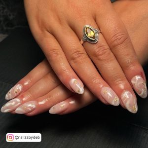 White Nails With Pink Marble For A Cute Look