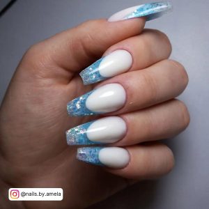 White Nails With Shimmery Blue Frenches On White Background