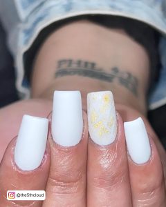 White Square Nails With Gold Design On One Nail