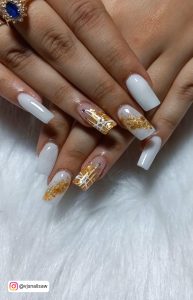 White Square Nails With One Gold Glitter Nail And Gold Glitter Design On One Nail