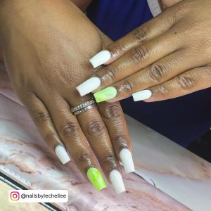 White Square Nails With One Green Square Nail