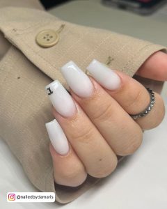 White Tip Coffin Nails With A Bat At The Tip