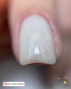 White With Gold Glitter On Short Nails