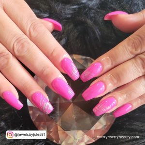 Acrylic Nails Long Coffin In Bright Pink Color With Silver Lines
