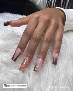 Acrylic Nails Pink In Transulent Shade And Brown Tips