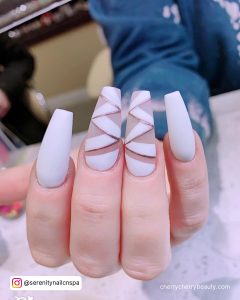 Acrylic Nails White Matte With Design On Two Fingers