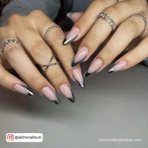 Acrylic Nails With Silver Tips In Stilleto Shape