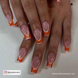 Acrylic Nails With White Outline And Orange Tips