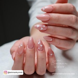 Almond Shape Pink Nails With Simple White Heart Design