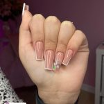 Beige Nails With White Outline With Design On One Finger