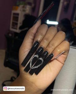 Black Acrylic Coffin Nails With A Heart Design