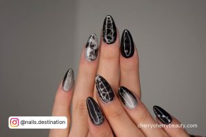 Black And Silver Acrylic Nail Designs In Almond Shape