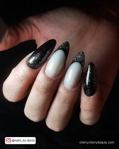 Black And Silver French Tip Nails In Stilleto Shape