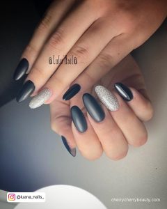 Black And Silver Glitter Nail Designs In Almond Shape