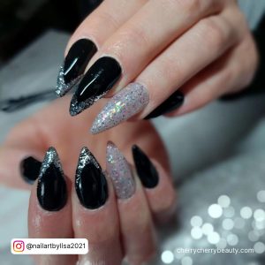 Black And Silver Glitter Ombre Nails In Stilleto Shape