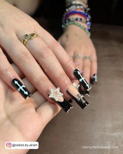 Black And White Acrylic Nails With Stars And Arrows
