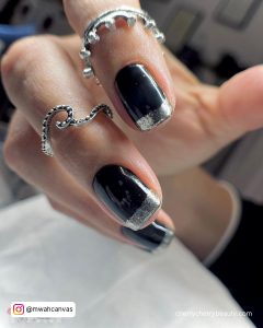 Black French Tip Nails With Silver For A Gothic Vibe