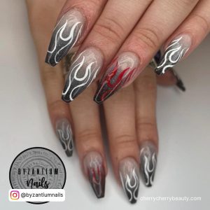 Black Nails With White Flames For A Gothic Look