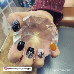 Black Silver Ombre Nails With One Nail In Mustard Color