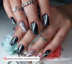 Black White And Silver Nails With A Glossy Finish