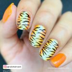 Black White Orange Nails With Zebra Print