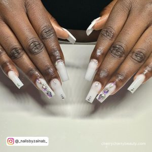 Bling White Coffin Nails With Rhinestones On A White Surface