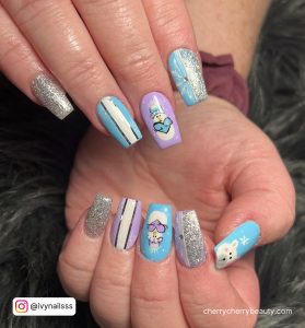 Blue And Silver Coffin Nails With Different Design On Each Finger