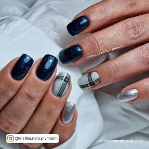 Blue And Silver Gel Nails With Check Pattern On Ring Finger