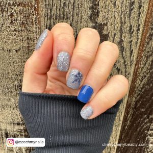 Blue And Silver Winter Nails With Snowflakes