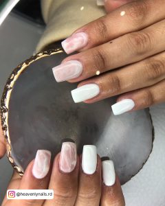 Brown And White Marble Nails Holding A Clutch