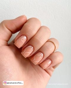 Brown And White Swirl Nails For An Everyday Look