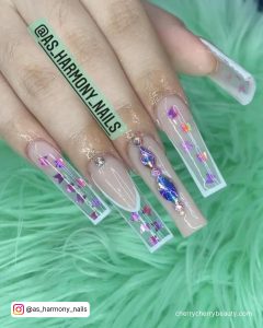 Clear Nails With White Outline And Rhinestones