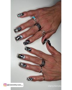 Coffin Black And White Acrylic Nails With Different Design On Each Finger