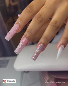 Coffin Pink Acrylic Nails With One Nail In Stilleto Shape