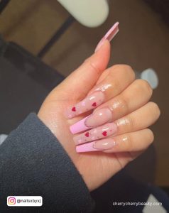 Coffin Shape Pink And Red Valentine Nails With French Tip Design And Small Red Hearts