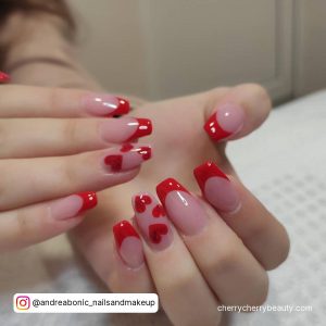 Coffin Shape Red Tip Nails Valentine'S Day With One Nail With Red Hearts