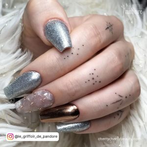 Coffin Silver Acrylic Nails With One Golden Nail