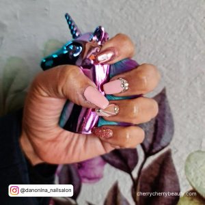 Cute Pink And Silver Nails With Metallic Finish On One Nail