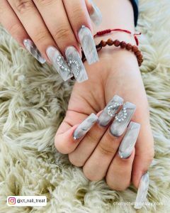 Cute White Nails With Rhinestone And Grey Marble Surface