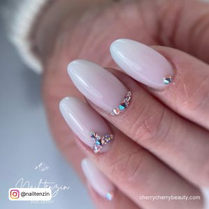 Cute White Nails With Rhinestone In Oval Shape