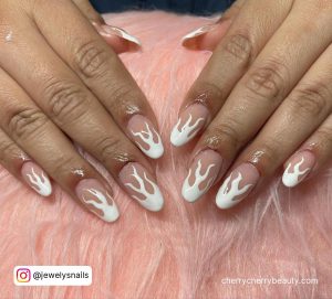 Flame Nails White On Pink Surface