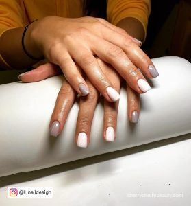 Gray And White Nail Designs On A White Towel