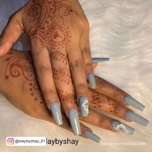 Gray And White Nails On Henna Hands