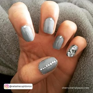 Gray Nails With White Design With Diamonds