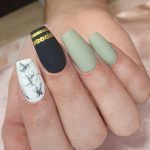 Green And White Nail Designs With One Black Nail